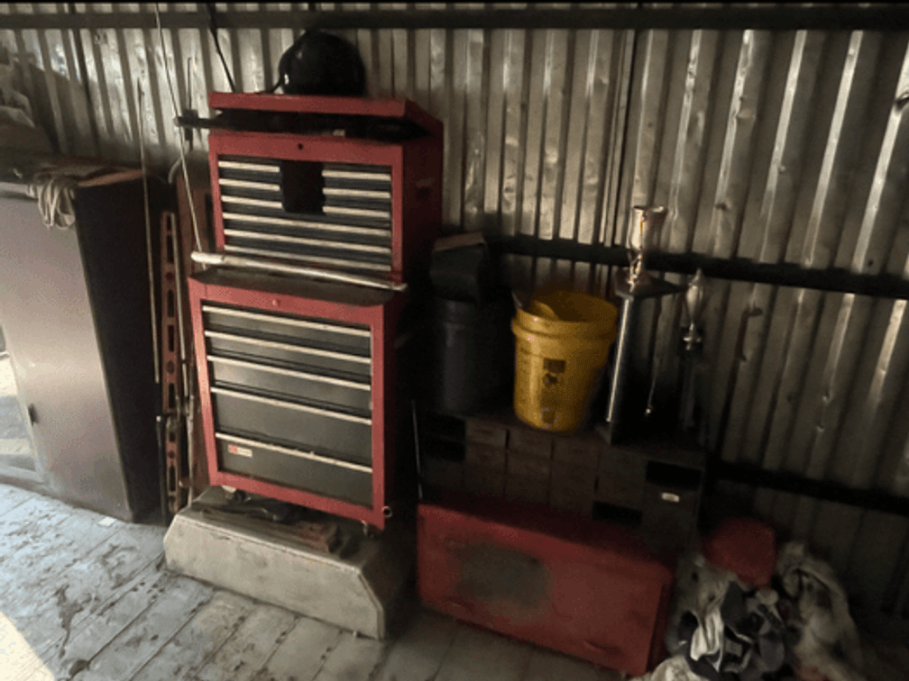All contents in truck body beside garage lot included