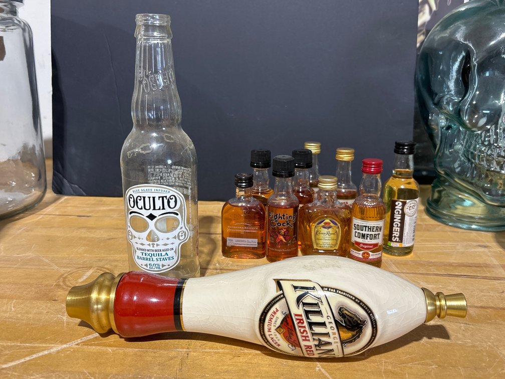 Beer tap and advertising bottles