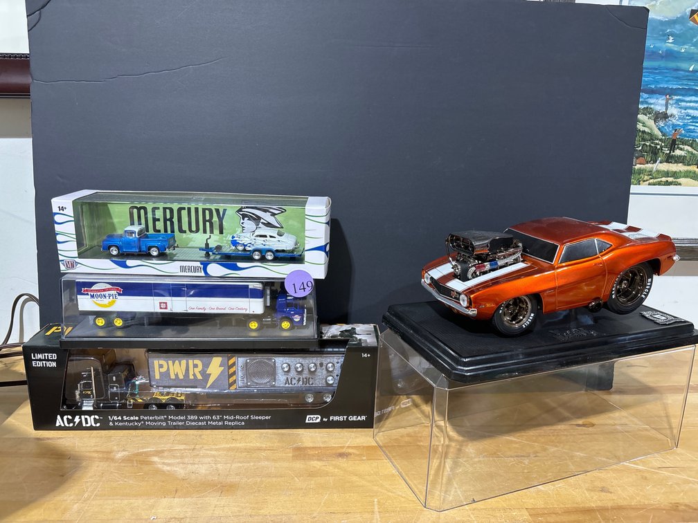 4 collectible models: Camaro, Mercury, 2 trucks