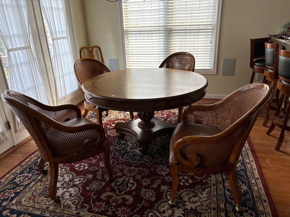 Round leather insert dining table w/ 4 drawers/4 matching chairs