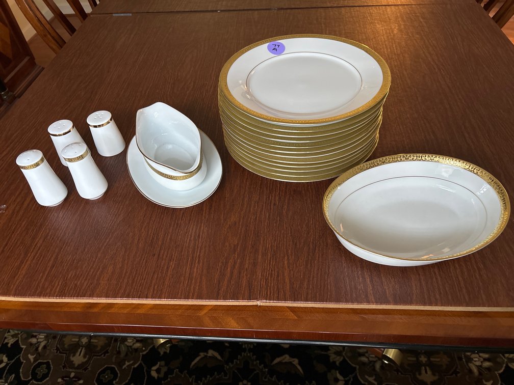 Gold-banded dinnerware: 12 plates, vegetable dish, gravy boat, 2 sets of s & p