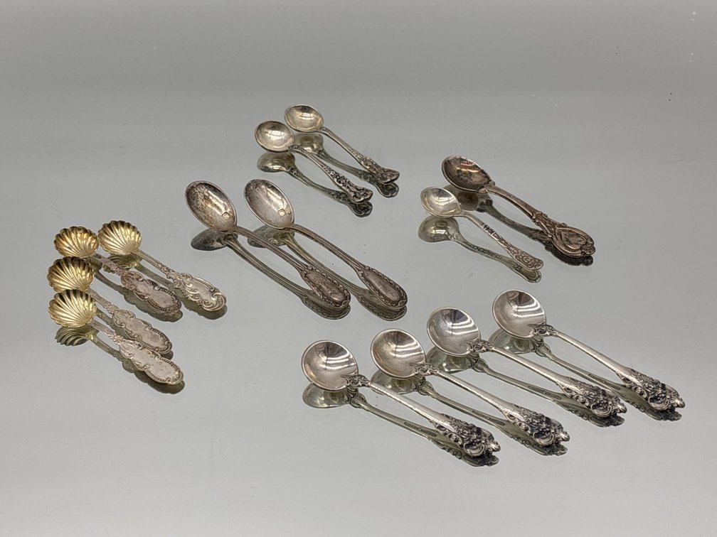 A Collection of Sterling and Silver Salt Spoons