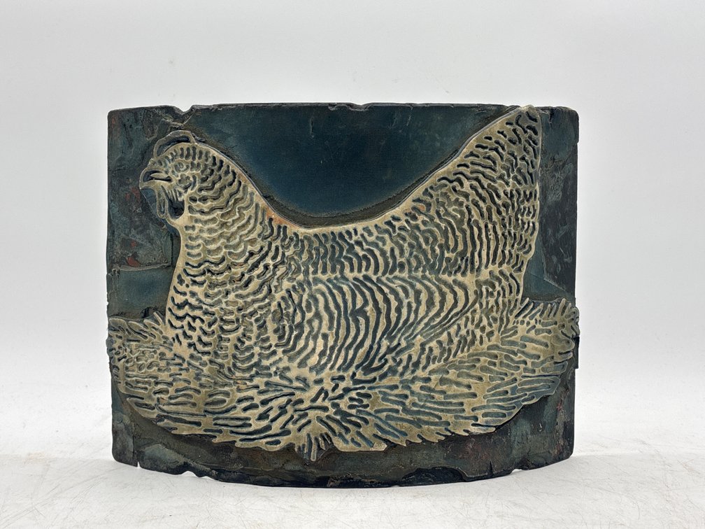 Concave Portion of a Printing Block as a Hen