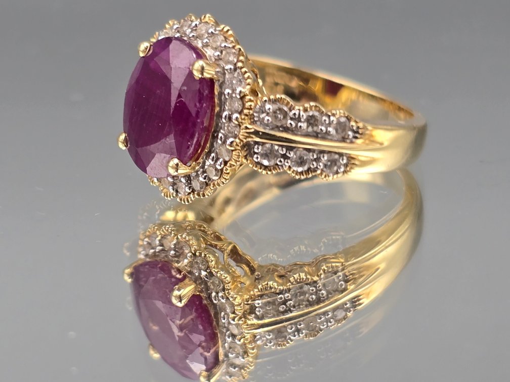 14K Oval Cut Ruby and Diamond Ring