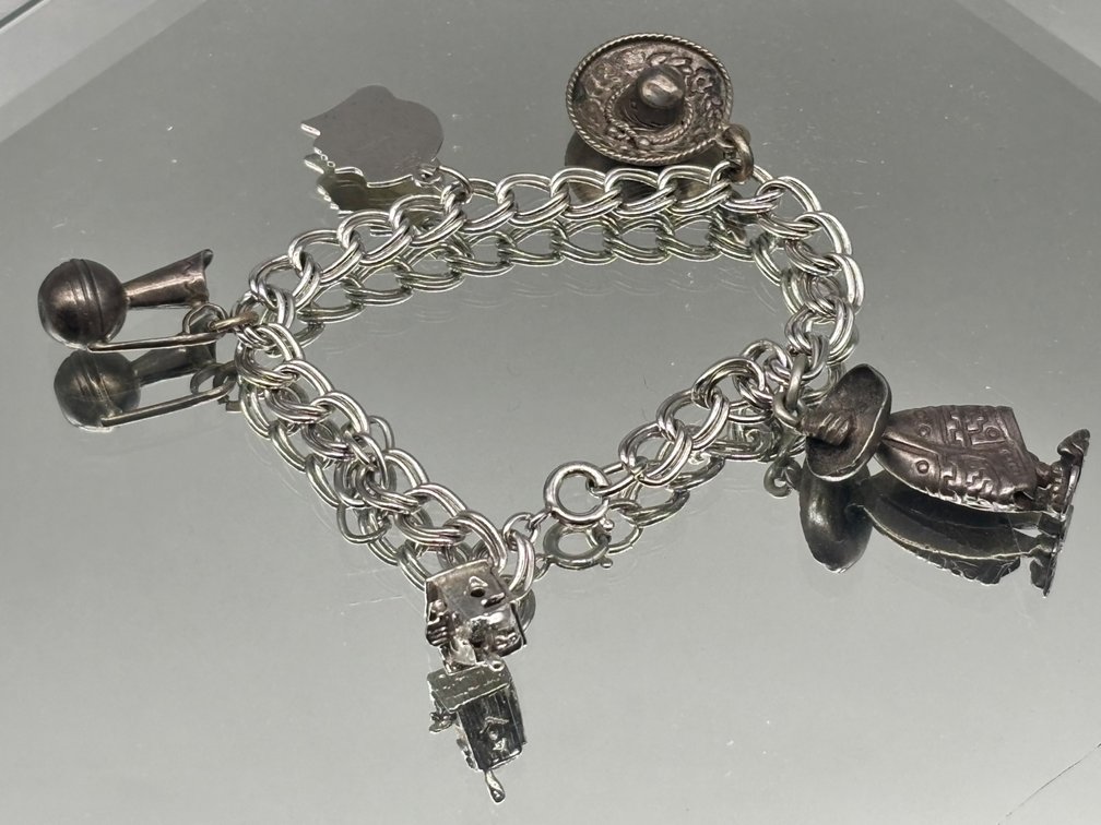 Sterling Silver Thematic Charm Bracelet