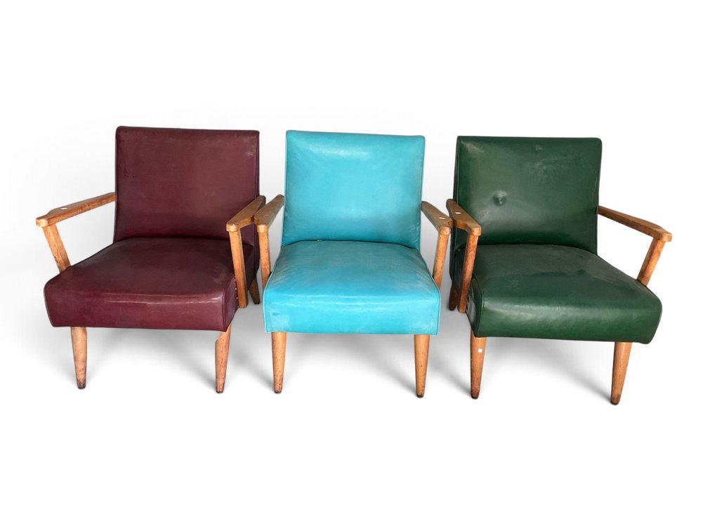 Three MCM Vinyl Arm Chairs