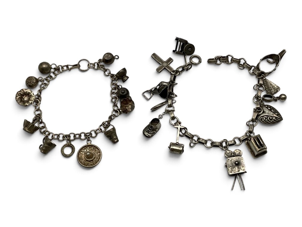 Two Silver Charm Bracelets
