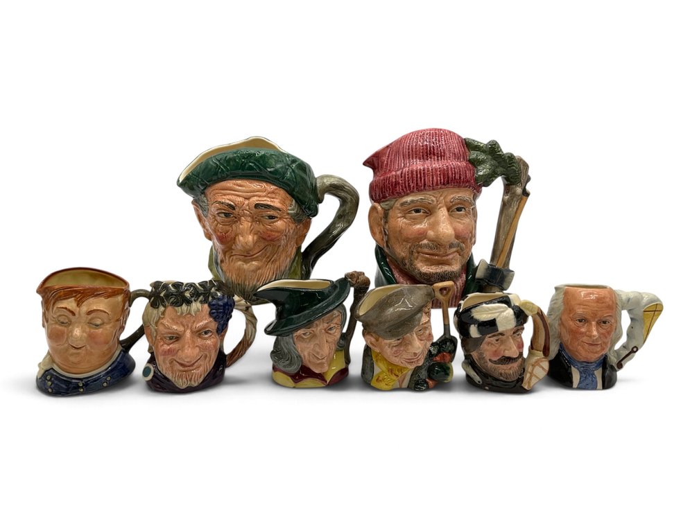 Eight Royal Doulton Toby Jugs