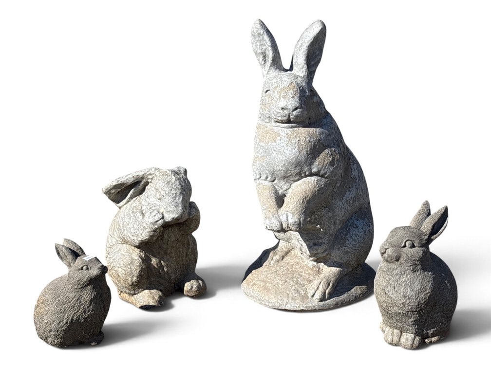 Four Composite and Cast Stone Rabbits