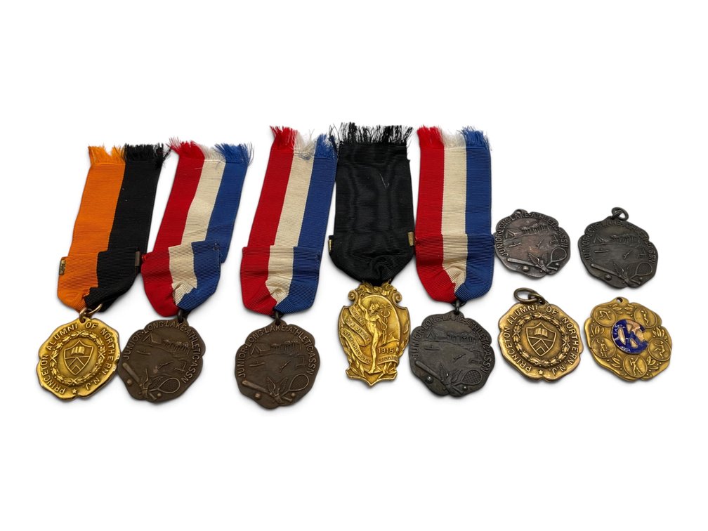 Nine Gold Filled and Sterling Sports Medals