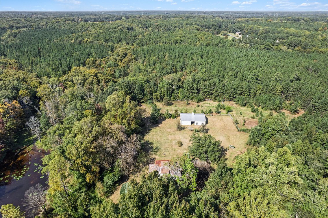 Image for 12466 Greenwood Road · Glen Allen, VA 23059 (Hanover County) 23.92 Acres · 1907 Home · 1-Acre Pond · 36x60 Barn - 4 stalls 12ft - 12ft