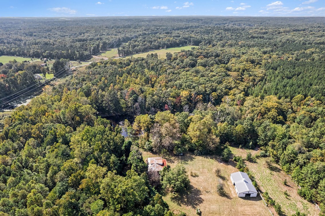 Image for 12466 Greenwood Road · Glen Allen, VA 23059 (Hanover County) 23.92 Acres · 1907 Home · 1-Acre Pond · 36x60 Barn - 4 stalls 12ft - 12ft
