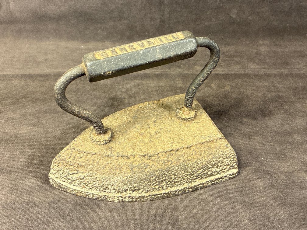 Sad iron