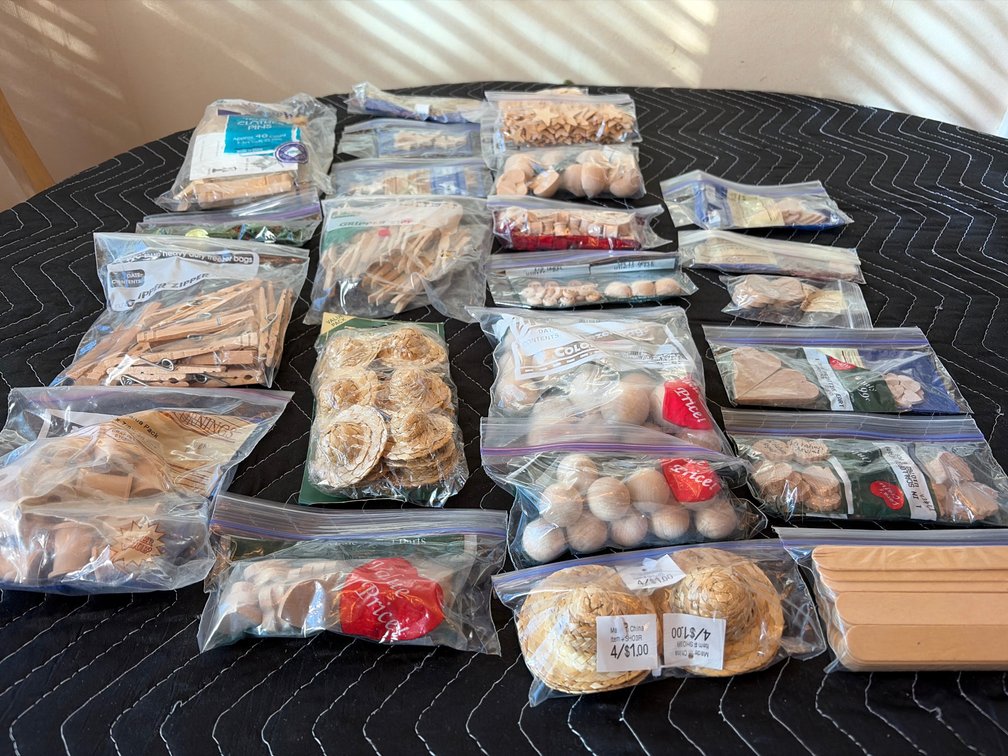 Craft supplies and small terra-cotta pots