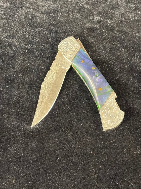 Handcrafted Damascus blade folding knife