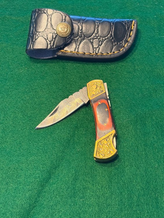 Folding Damascus knife with sheath