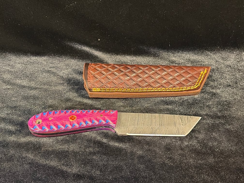 Damascus handcrafted knife, pink artistic handle, heavy leather sheath