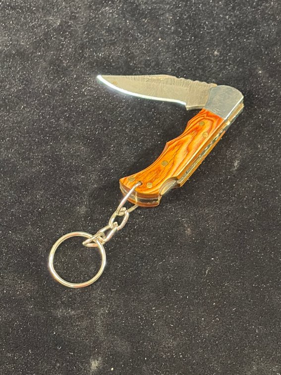 Small Damascus folding knife with keychain