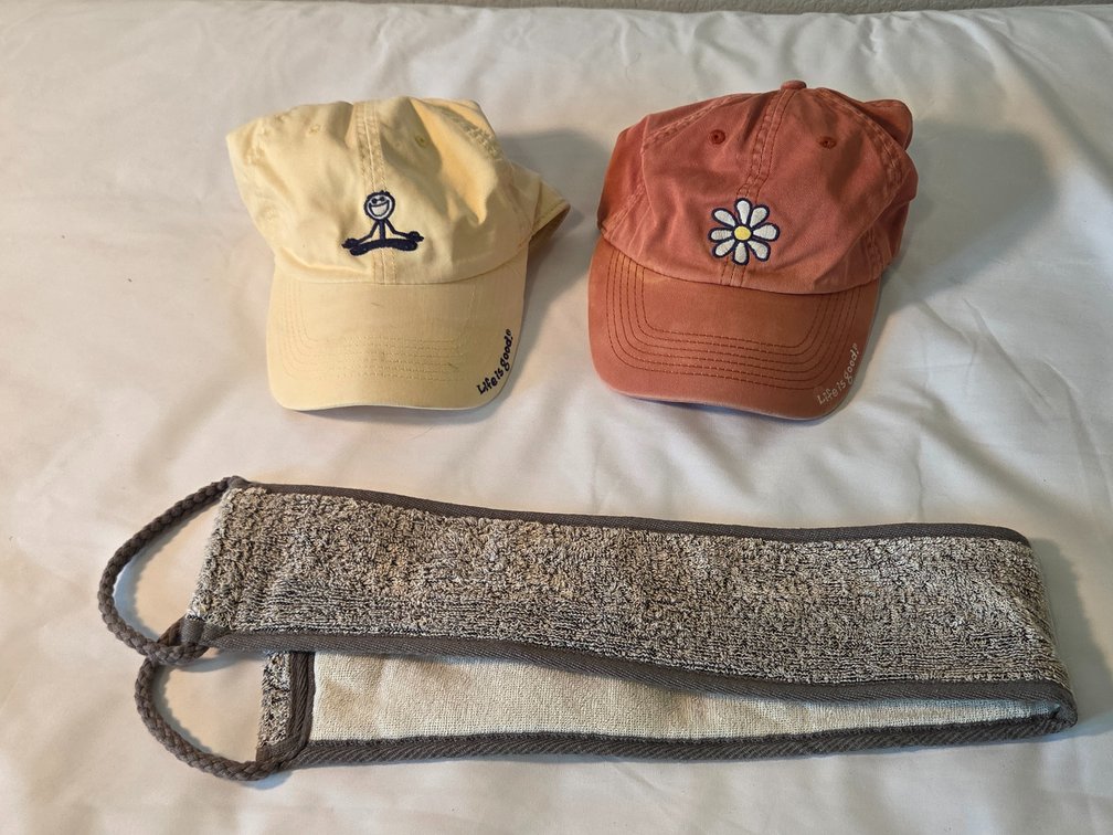 2 ball caps and an outdoor neck coolie