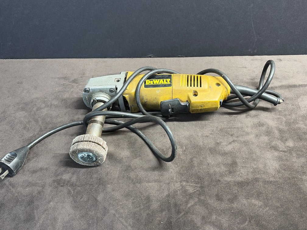 DeWalt 4 1/2 inch side grinder with polishing wheel
