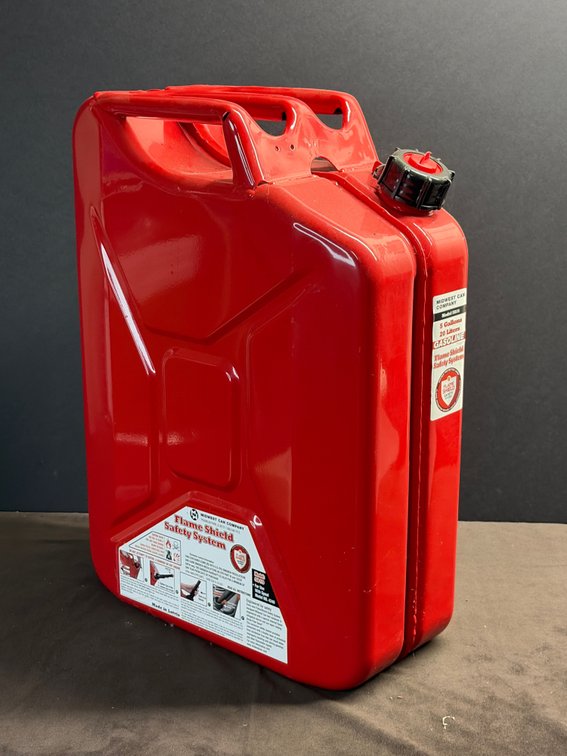 Flame shield safety metal fuel can