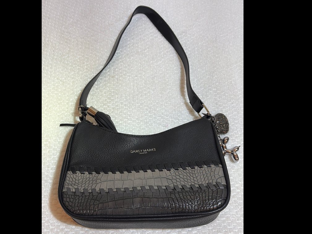black leather shoulder bag by Darcy Marks