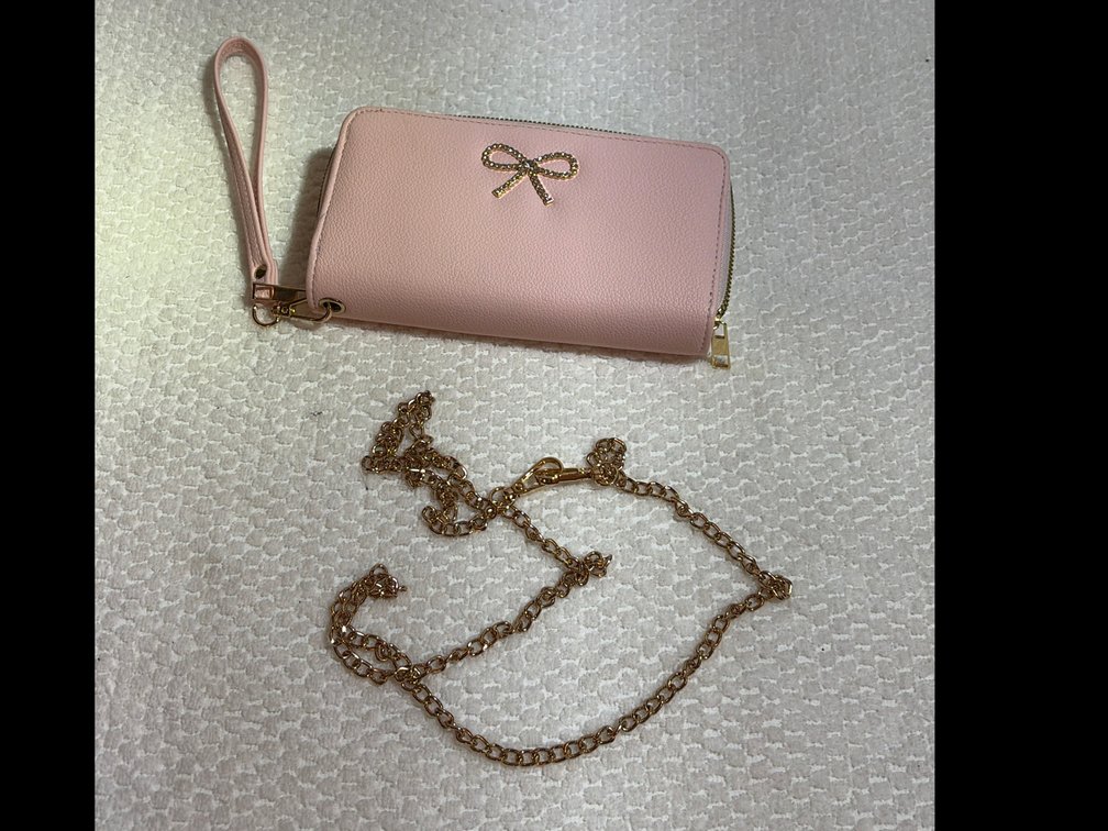 Pink bow wristlet wallet and detachable gold-toned chain strap