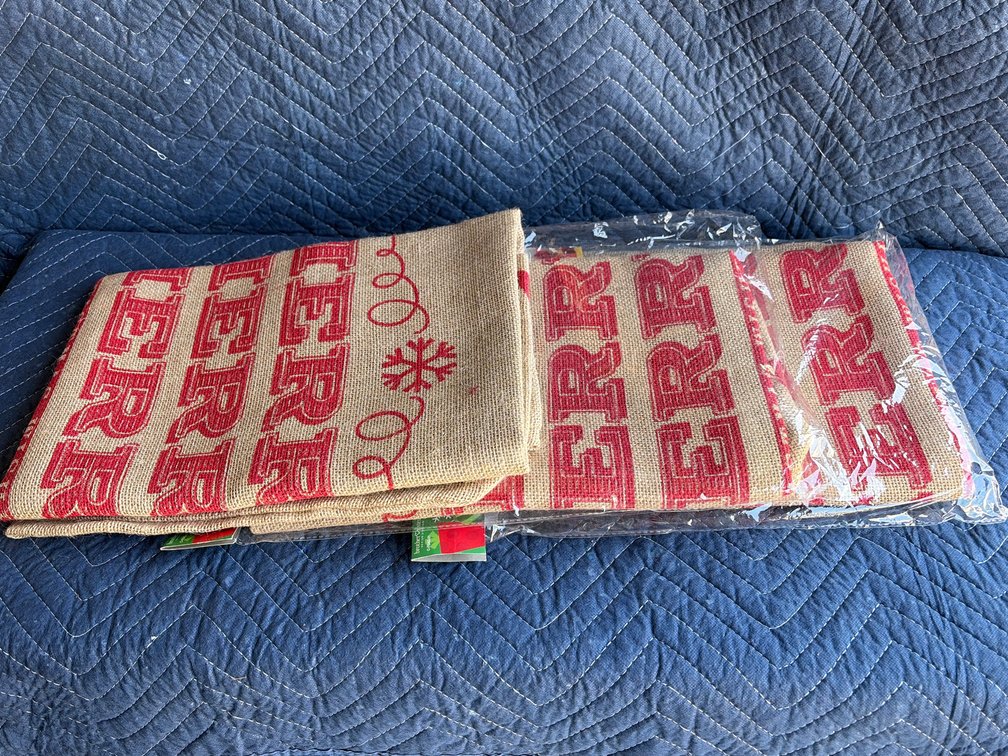 Group of three merry Christmas burlap gift bags