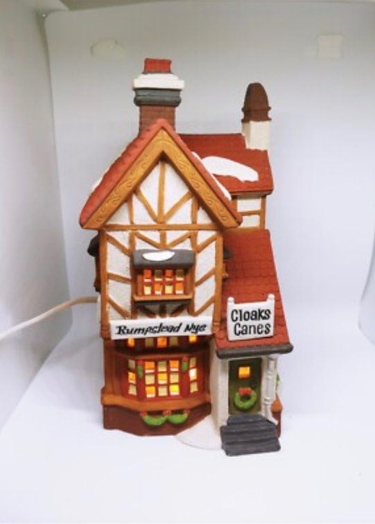 a Department 56 Heritage Village Series "Bumpstead Nye Cloaks & Canes"