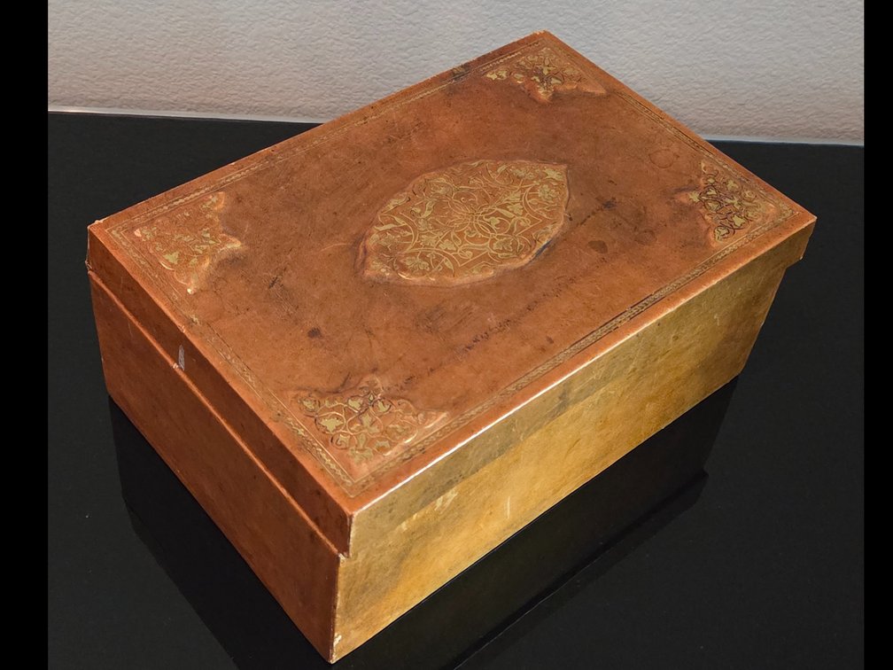 Antique Leather Bound Storage Box with a cache of pens