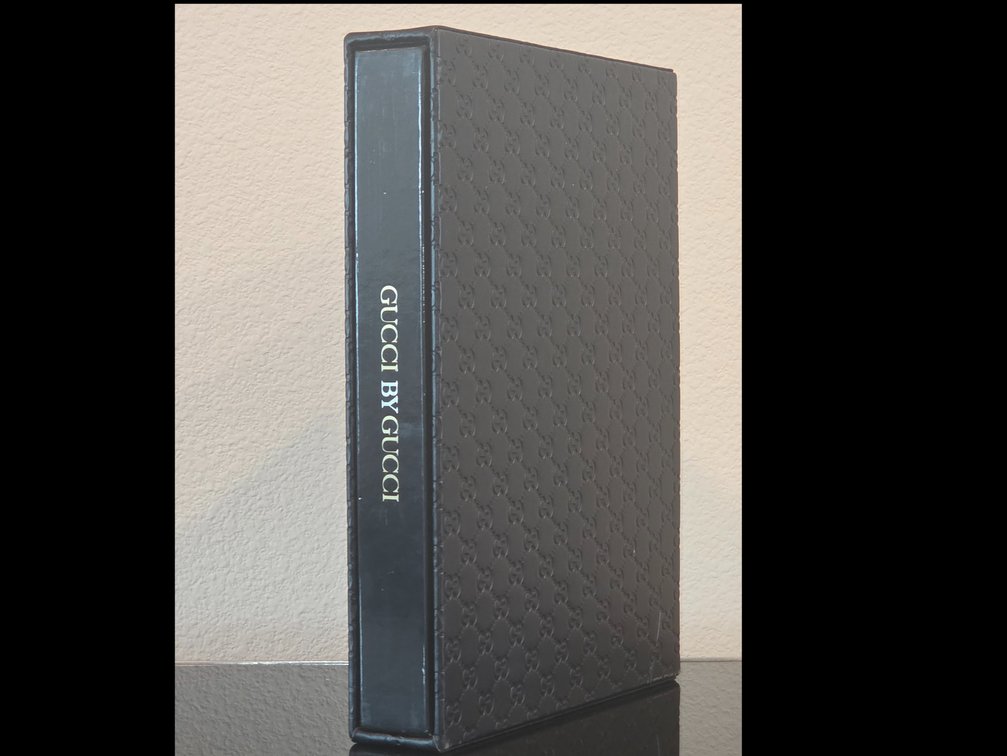Collector's coffee table book Gucci by Gucci: 85 Years of Gucci, written by Sarah Mower and published in 2006