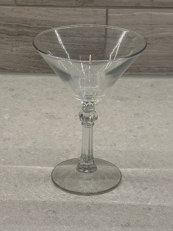 (3) clear glass martini or cocktail glass featuring a classic triangular bowl, a fluted or beaded ball detail on the stem, and a round flat base