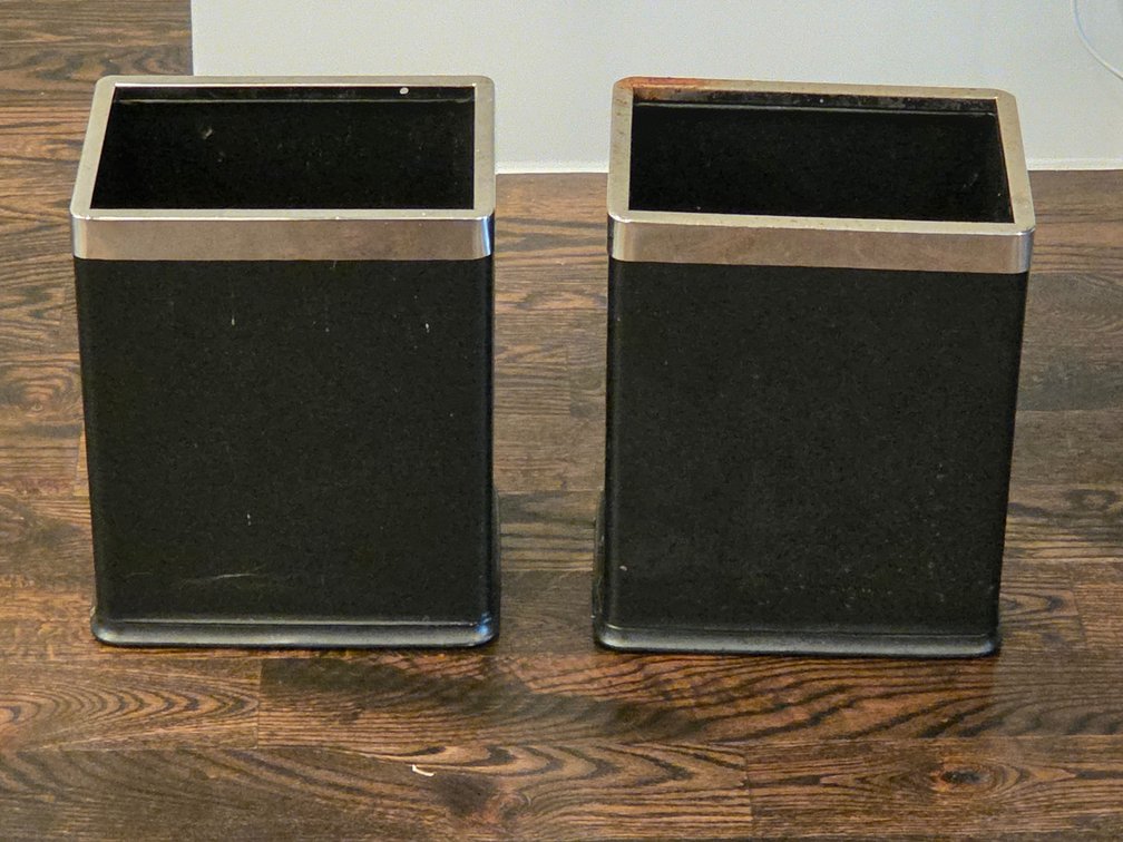 Pair of small black trashcans with metallic silver toned rim