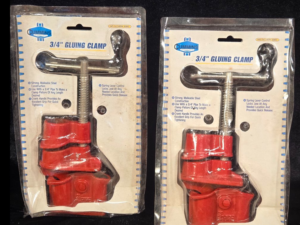 Two 3/4" steel gluing clamps