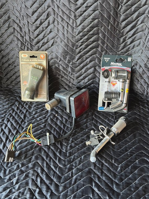 Receiver hitch, lock pins, brake light and wiring adapter