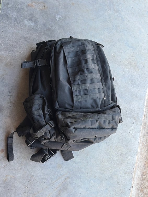Black tactical backpack with Molly straps