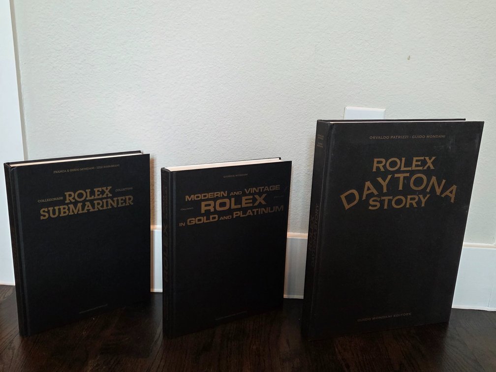 3 collectible Guido Mondani Editore hardcover coffee table books on Rolex watches