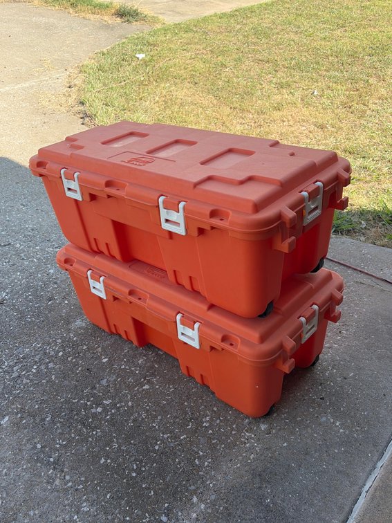 (2) Plano Orange Trunks