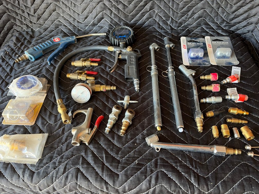 Group of air gauges, ball, tire, chucks, pneumatic fittings, nozzles