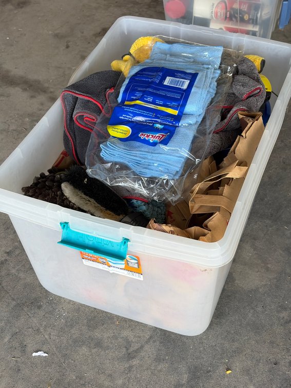 Tub full of cleaning stuff