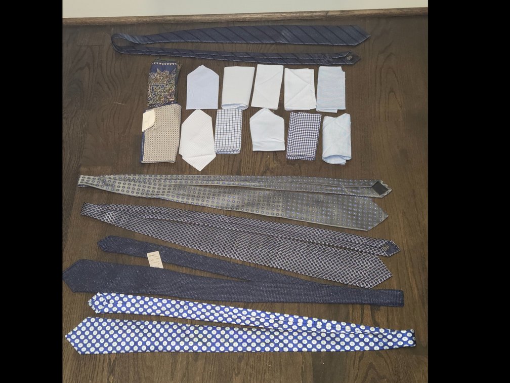 5 blue neck ties and 12 blue pocket squares