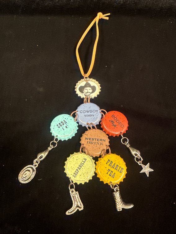 cowboy-themed bottle cap ornament/doll