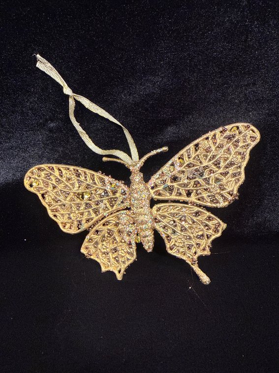 gold-toned, glitter-covered butterfly ornament