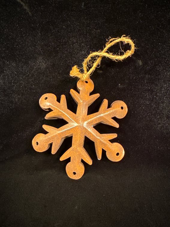 Metal snowflake-shaped Christmas tree ornament