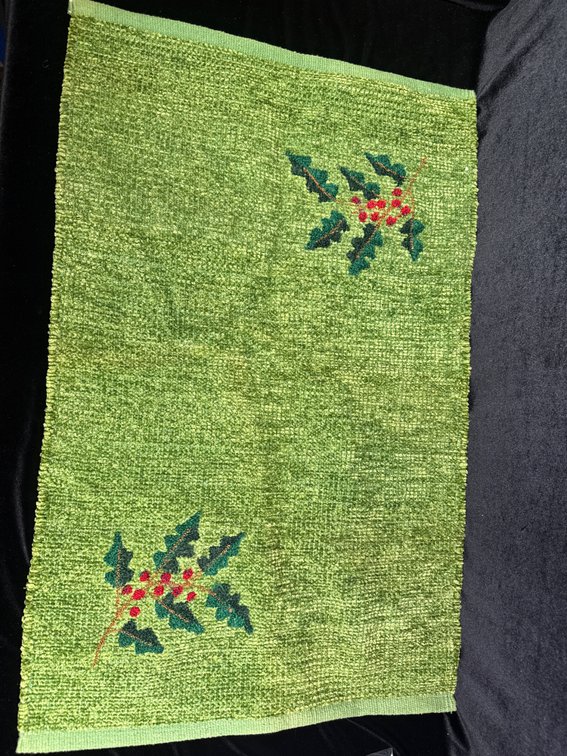 Mahdavis Mistletoe Holiday Accent Rug, a green chenille/rag rug measuring approximately 20" x 30" featuring embroidered or tufted mistletoe and red berry accents