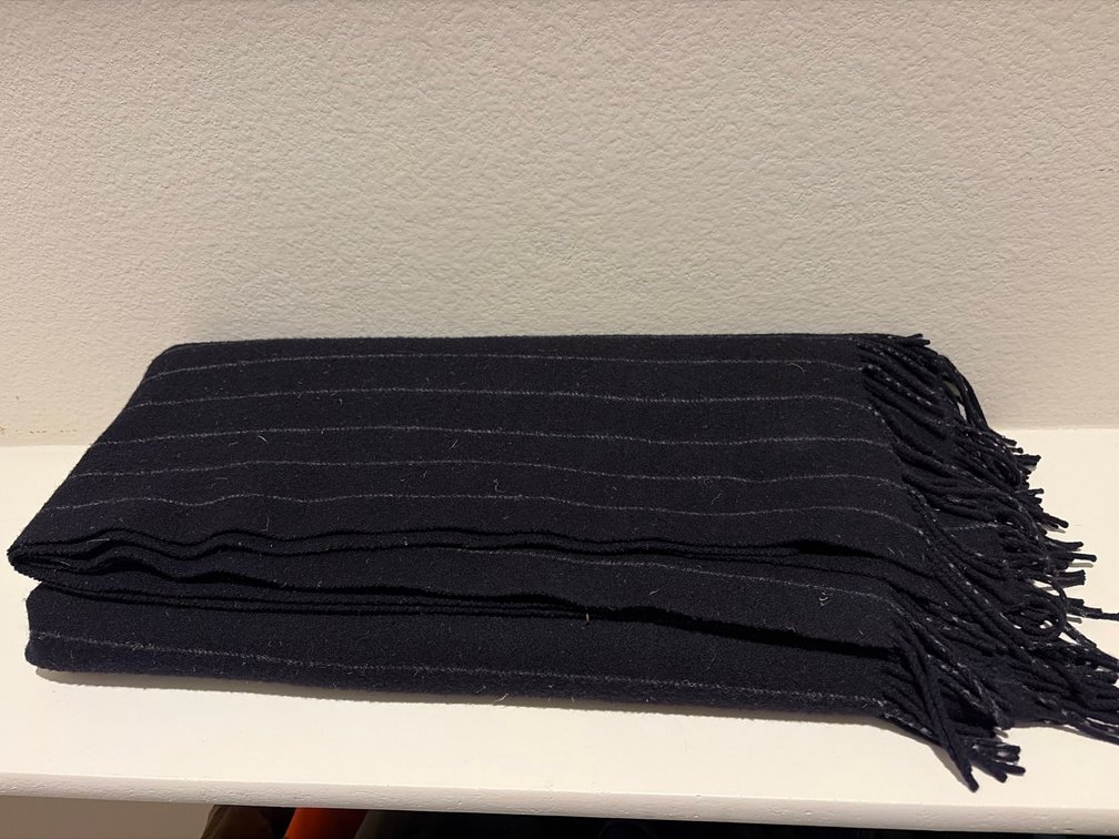 Black pin stripe cashmere sofa blanket with tassels