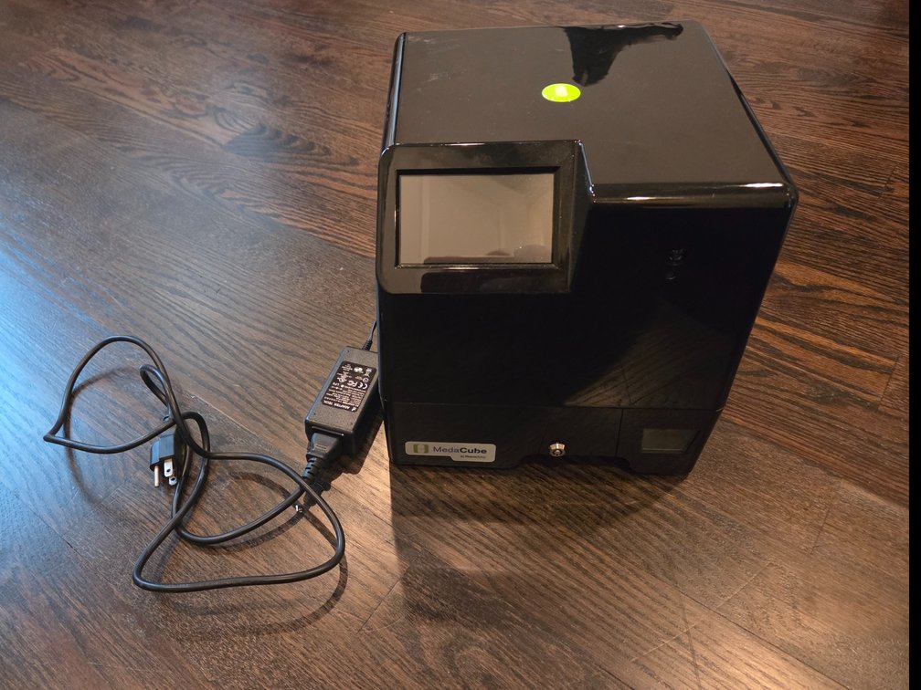 a MedaCube Automatic Pill Dispenser