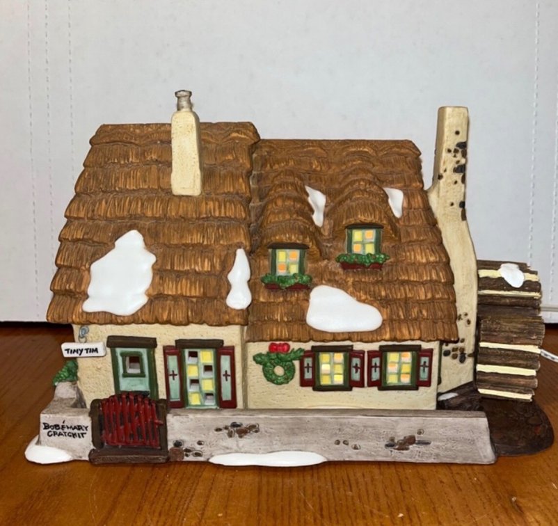 Department 56 Dickens' Village Series handpainted porcelain piece titled "The Cottage of Bob Cratchit and Tiny Tim" (Item #6500-5)