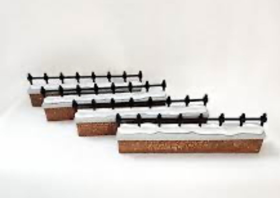the "Churchyard Fence Extensions" (Item #5807-6), a set of 4 handpainted porcelain accessories from the Heritage Village Collection by Department 56