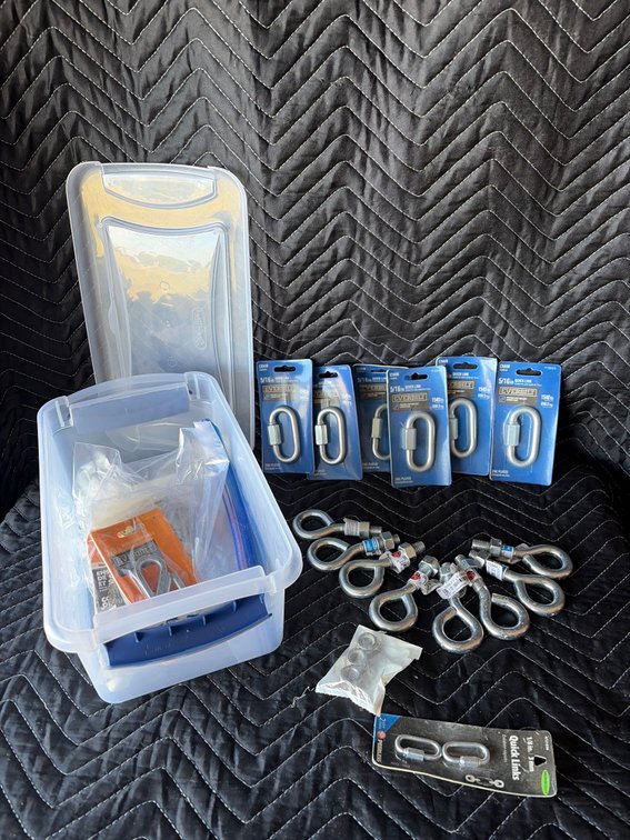 Clear tote with hardware, quick links eye bolts